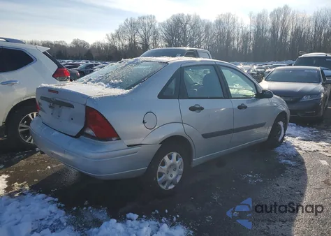 2004 Ford Focus Lx z USA, uszkodzony, nr VIN 1FAFP33P44W166076